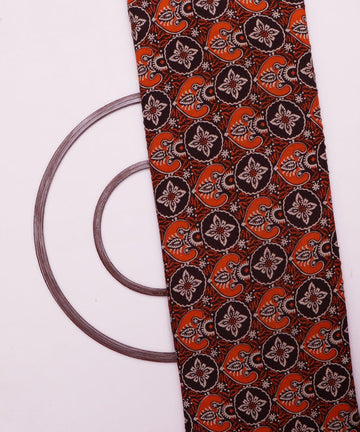 brown and orange ajrakh print rayon fabric